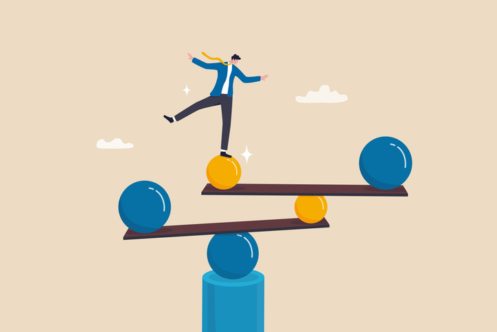 businessman balance himself on stable weigh