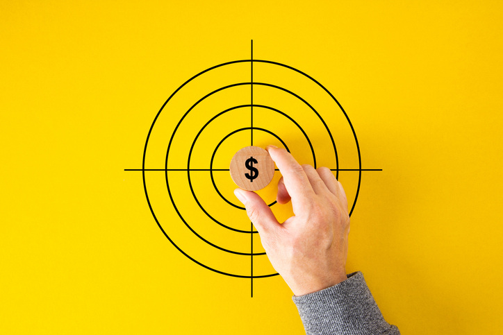 Dollar icon, in the center of the target on a yellow background